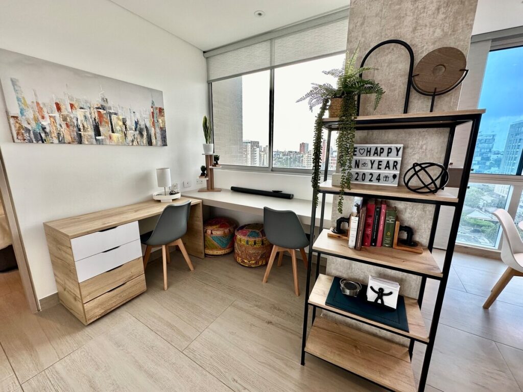 Modern dual workspace with wooden desks and large bright windows